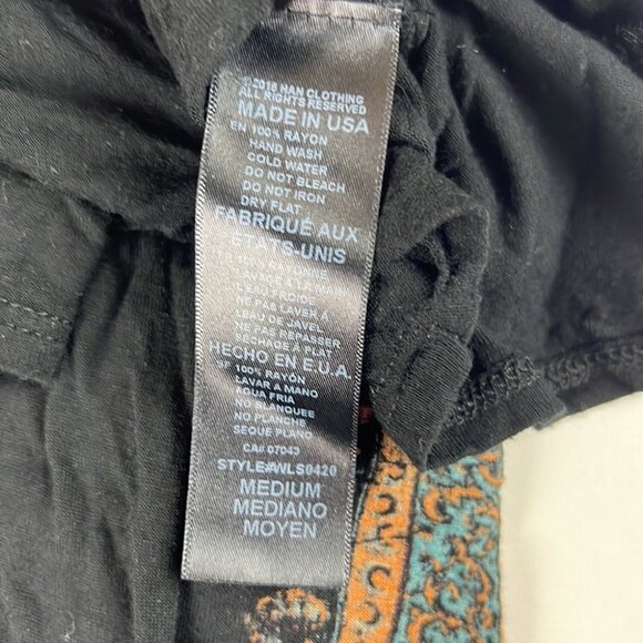 the classic black long sleeved open back with graphic front size medium - Picture 8 of 9